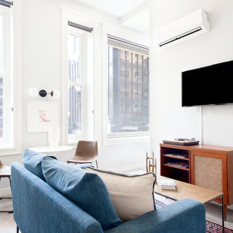 Play some tunes on the turntable and put your feet up in the apartment