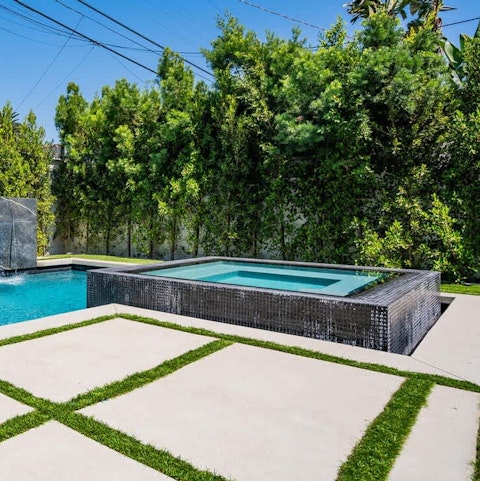 Spend sunny days relaxing in the hot tub