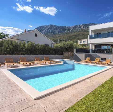 Swim in the sparkling pool to cool off in the Croatian sun