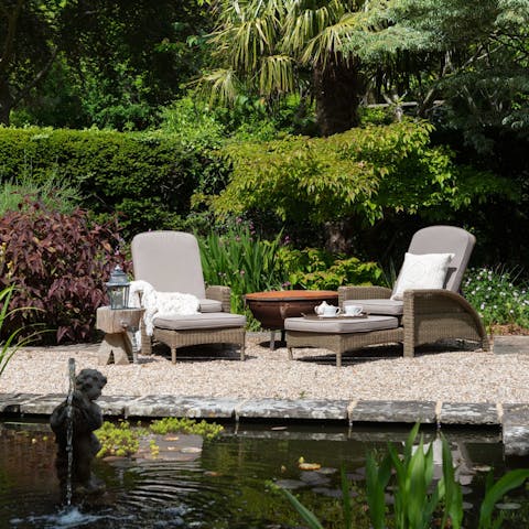 Soak up the sunshine by the ornamental pond and fountain