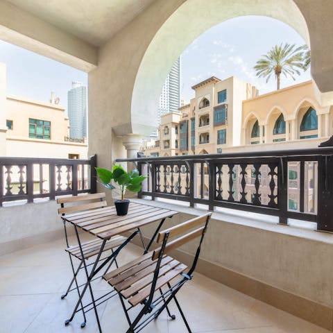 Enjoy your morning coffee with stunning city views including the Burj Khalifa