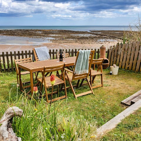 Dine alfresco with the sea as your backdrop