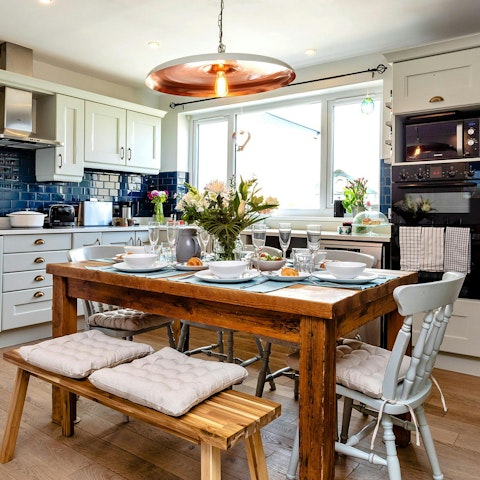 Gather around the dining table for an evening meal or a board game