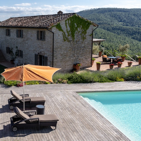 Savour relaxing afternoons reading by the pool