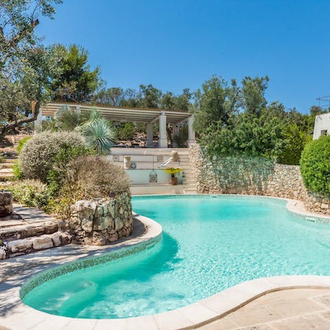 Float around the lagoon-style saltwater pool