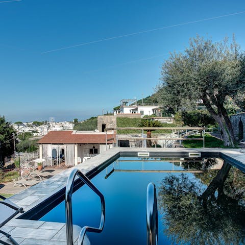 Find peace and relaxation while lounging by the pool