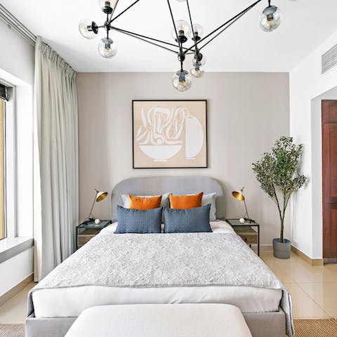 Draw the blackout drapes and bank a peaceful night's sleep in the king-sized bed