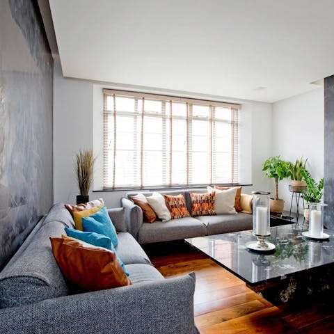 Get cosy in the living space after a long day exploring London