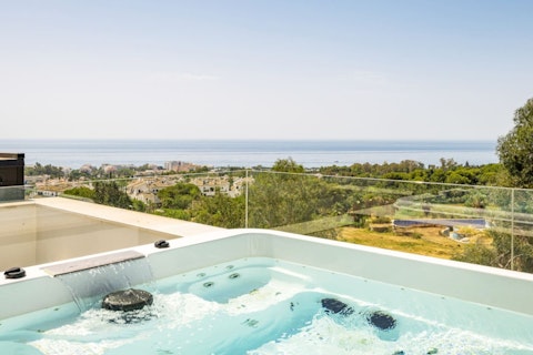 Soak above Marbella in the private hot tub