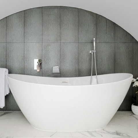 Enjoy a luxurious soak in the freestanding bath