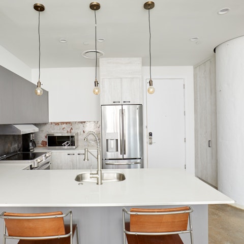 Sip a glass of wine while waiting for your dinner to cook