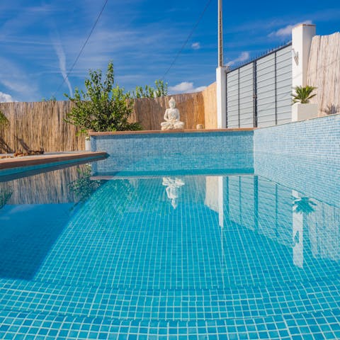 Plunge into the inviting turquoise pool in the heat of the day