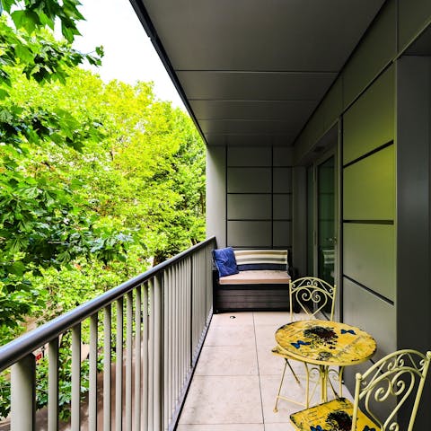 Sip your morning coffee on the private balcony as the city wakes below