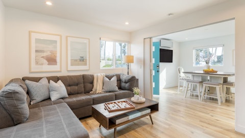 Stretch out on the sectional sofa after a day at the beach