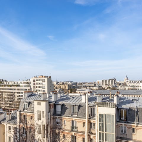 Gaze out over the city rooftops from your tenth-floor apartment