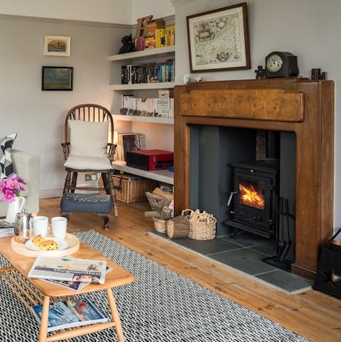 Cosy up in front of the wood-burning stove with a mug of hot cocoa