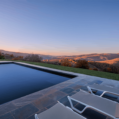 Drink in incredible views while swimming in the private pool