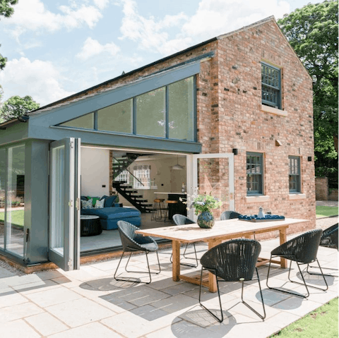 Throw open the glass doors and sit outside on the immaculate patio