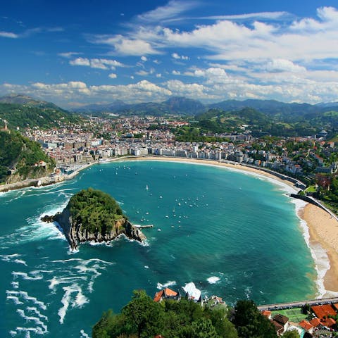 Stay just steps from the golden sands of La Concha and its horseshoe-shaped bay