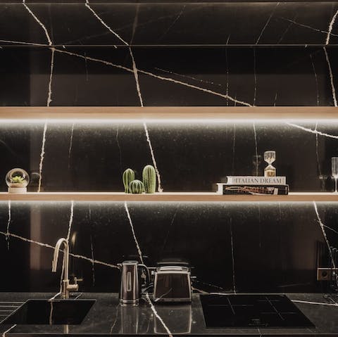 Fire up the coffee pod machine in the sleek, modern kitchen