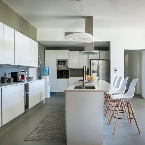 Rustle up brunch and mimosas in the sleek, modern kitchen