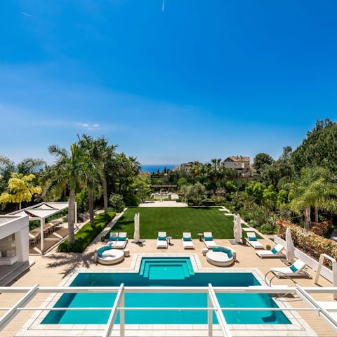 Spend your days drifting between the pool and a sun lounger