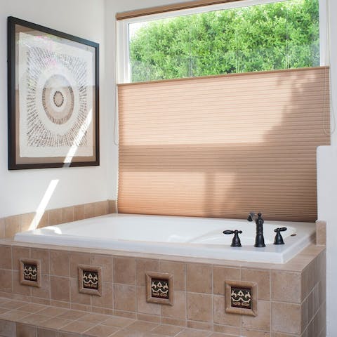 Take a long soak in the decadent tub