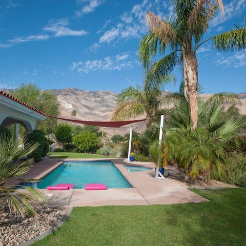 Admire the rugged landscape from the poolside