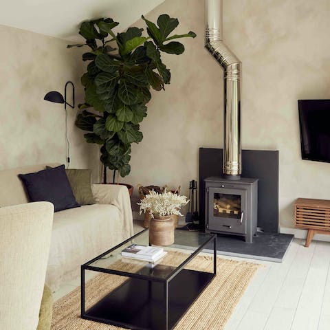 Cosy up in front of the fire after a day along the coast front
