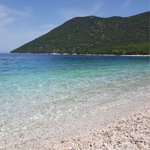 Begin your Kefalonia stay with a stroll to Lourdas Beach
