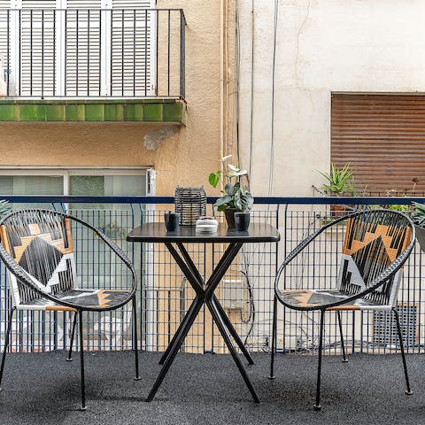 Soak up the magic of coastal living from the little balcony