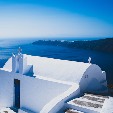 Explore the romantic village of Imerovigli, perched high about the Aegean