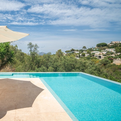 Find peace and relaxation while lounging by the pool