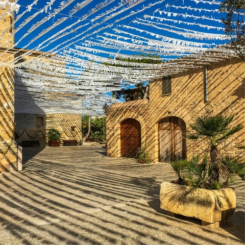 Explore the historic heart of Alcúdia – a short drive away