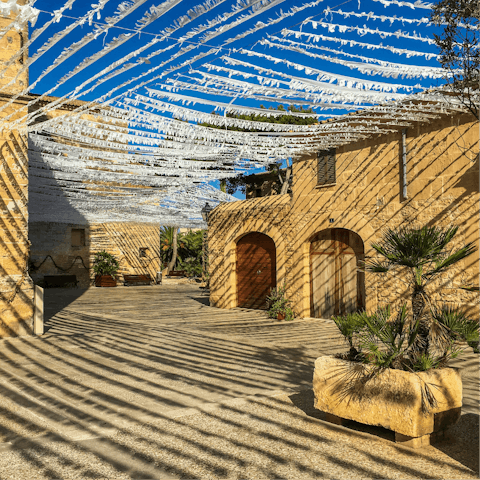 Explore the historic heart of Alcúdia – a short drive away