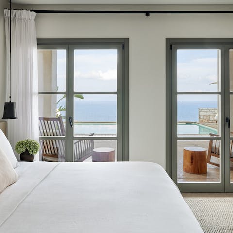 Wake up to sunlight streaming in from the doors to the terrace