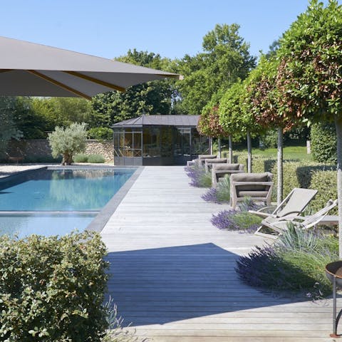 Grab a glass of rosé and settle in by the pool