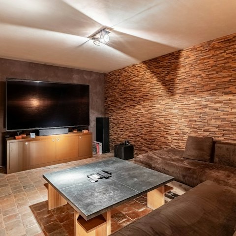 Catch up on some cinema in the home theatre, seating ten