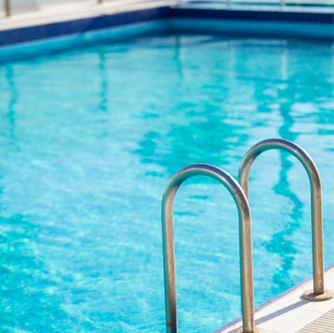 Unwind in the communal pool and gym
