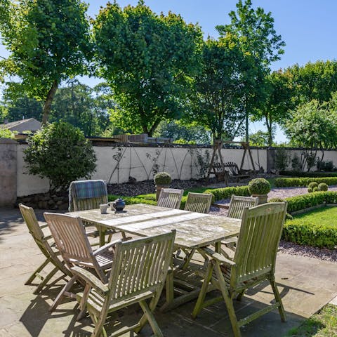 Gather in the beautiful garden for alfresco meals