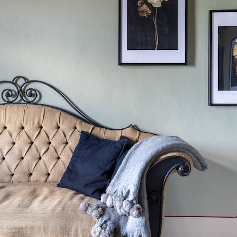 Make yourself at home in the welcome living area filled with antiques