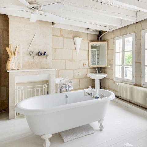 Unwind in the elegant roll top bath