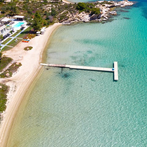 Sail from the mainland to your private beach with pontoon access