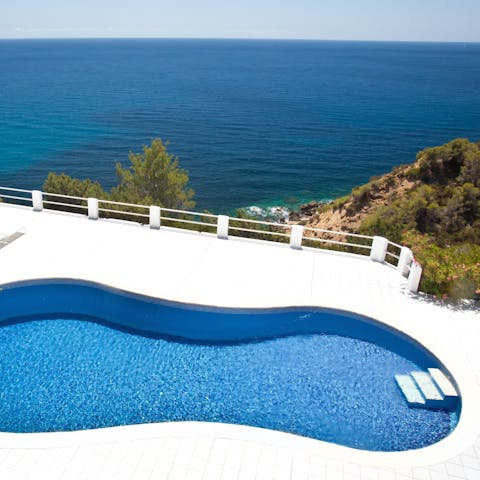 Take a refreshing dip in the communal pool – a short walk away