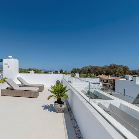 Catch some rays and admire the views from the balcony