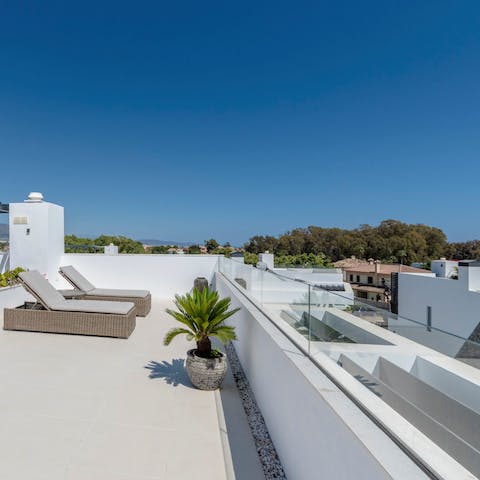 Catch some rays and admire the views from the balcony
