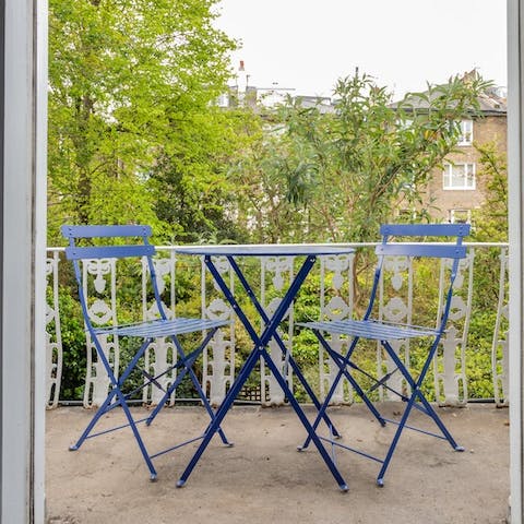 Surround yourself with verdant greenery on the private balcony