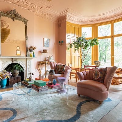 Read a book in the colourful living room