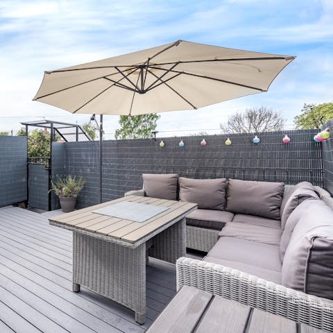 Enjoy an evening cocktail on the rooftop terrace