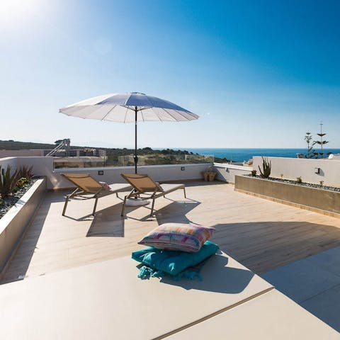 Climb up to the roof terrace for coastline views, perfect for the evenings